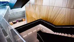 Next to the functional art walls are two large staircases with exposed engineering so students can study them