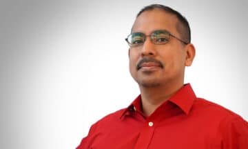 A headshot of Edgar Lobaton standing in front of a white background.