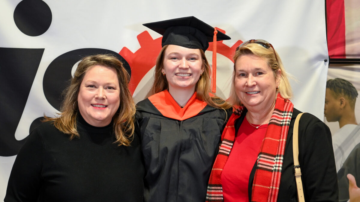 OR Students celebrating graduation during reception.