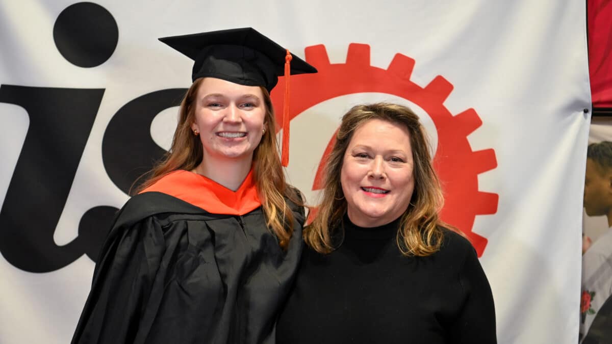 OR Students celebrating graduation during reception.