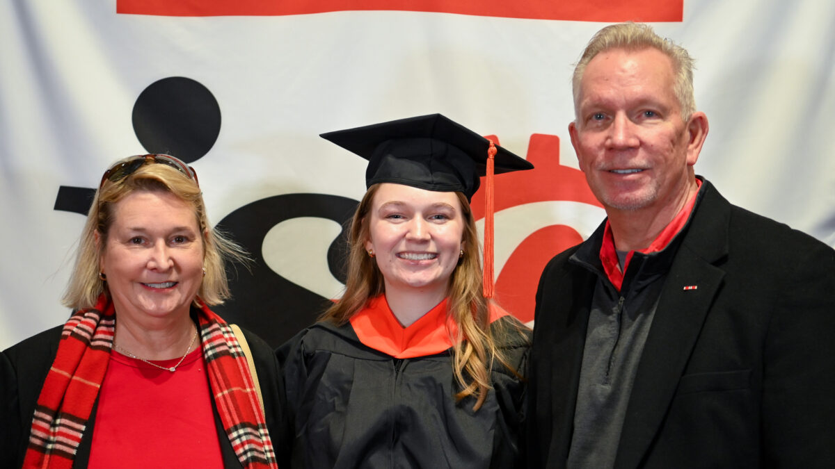 OR Students celebrating graduation during reception.