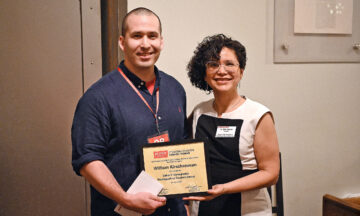 WIll Kirschenman receiving his award from Maria Mayorga