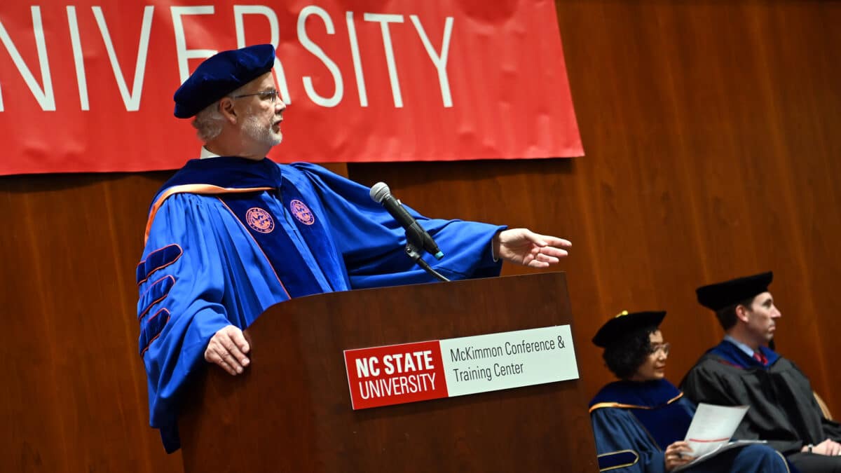 ISE Director of Graduate Programs, Russel King, steps up to the podium to announce each OR graduate