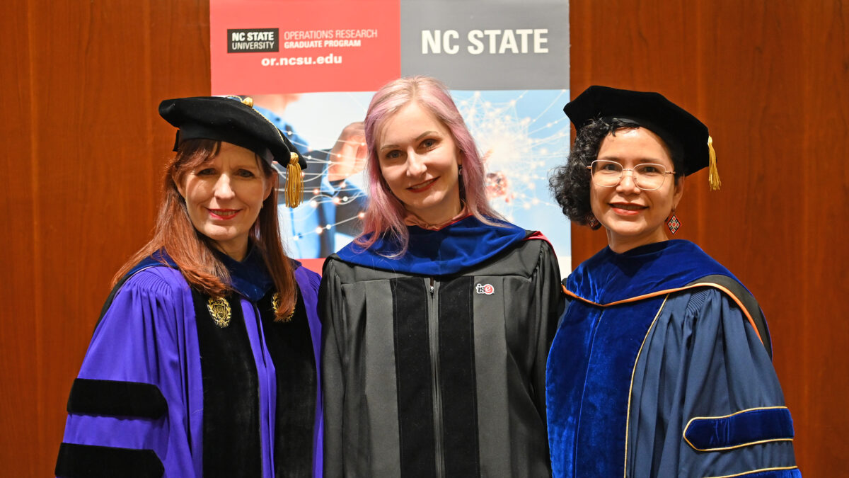 OR Alumna Natalia Summerville flanked on the right by Julie Swann and on the left by Maria Mayorga