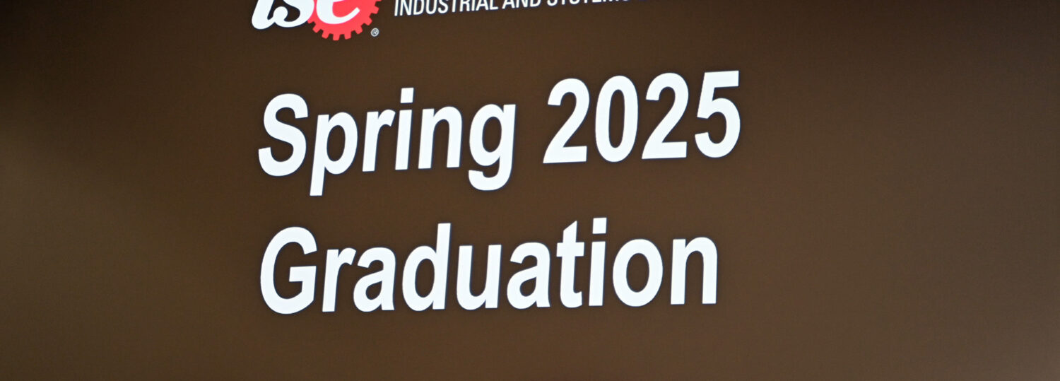 A welcome message to the OR Spring 2025 Graduation Ceremony shown on a giant screen